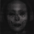 ORLAN_Self_hybridation_du_portrait_dORLAN_avec_un_crane_par_les_services_de_police_criminelle_37_x_48_cm_1997_72DPI