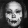 ORLAN_Self_hybridation_du_portrait_dORLAN_avec_un_crane_par_les_services_de_police_criminelle_37_x_48_cm_1997_72DPI